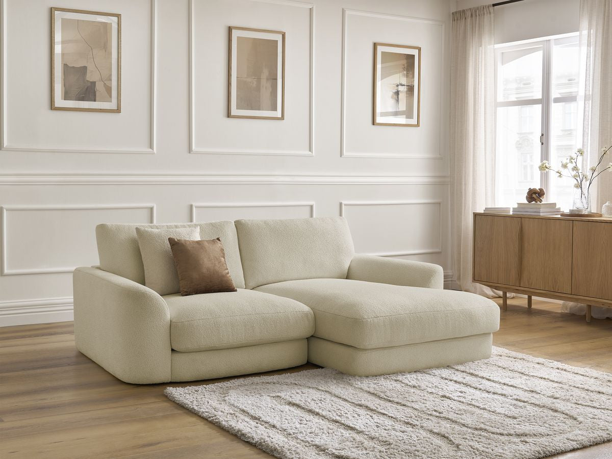Hjørnesofa LEONORE i bouclé-stoff