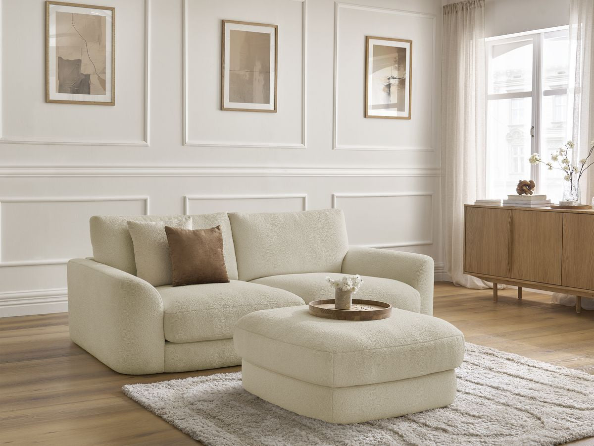 Rett sofa LEONORE i bouclé-stoff med puff