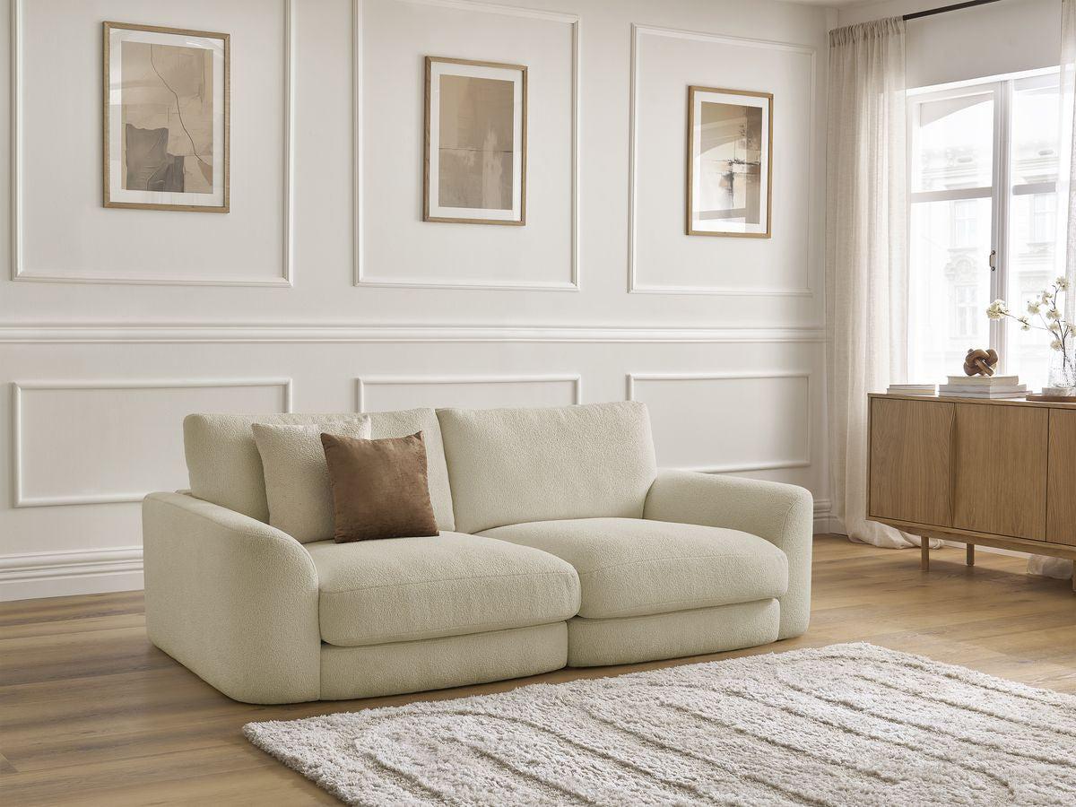 Rett sofa LEONORE i bouclé-stoff