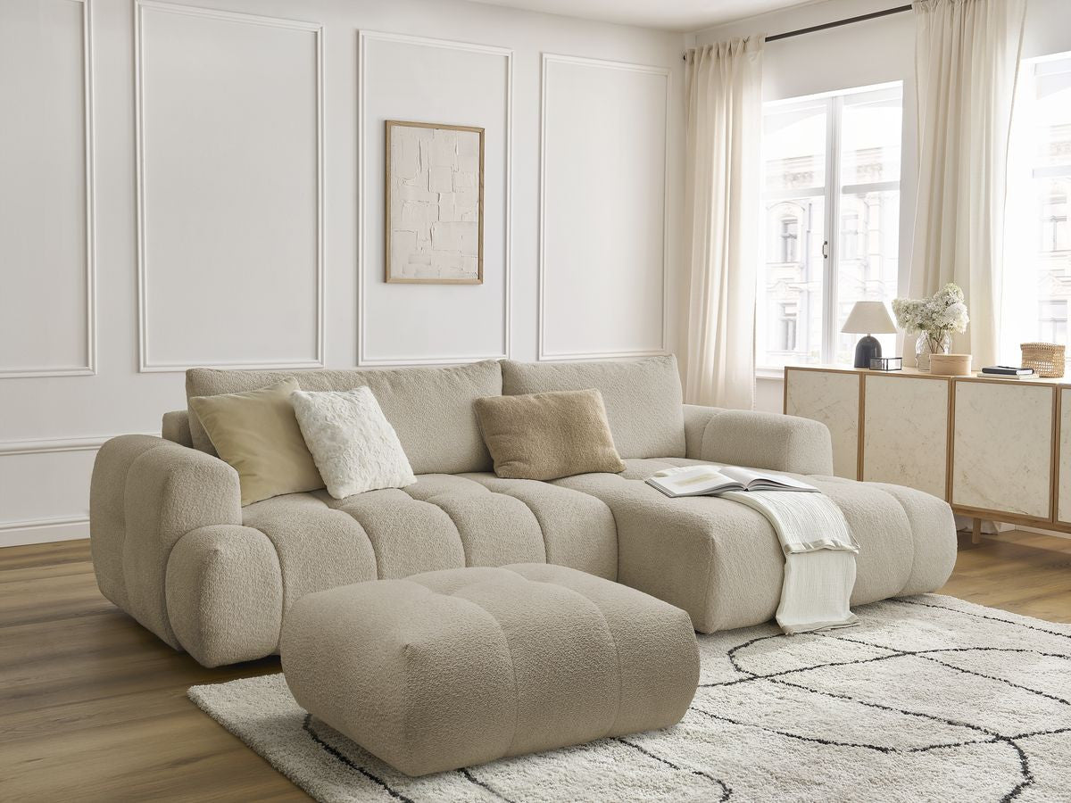 Hjørnesovesofa FUJI i bouclé-stoff med puff