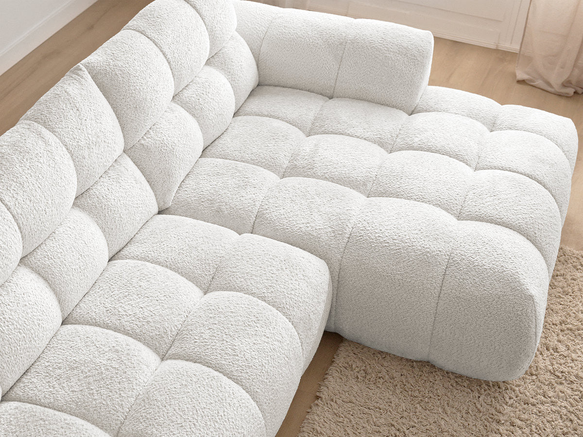 Hjørnesofa JAYA i chenille med puff
