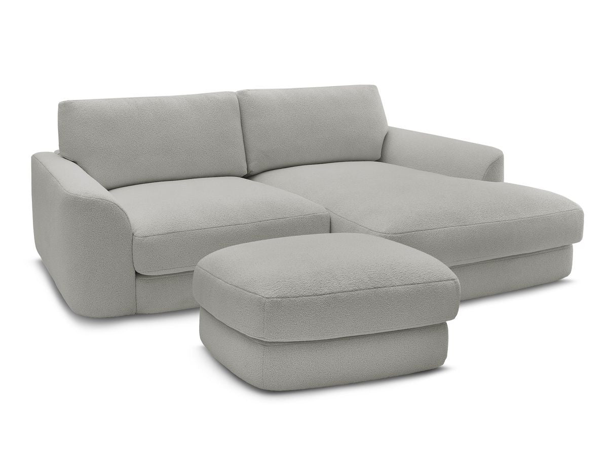 Hjørnesofa LEONORE i bouclé-stoff med puff