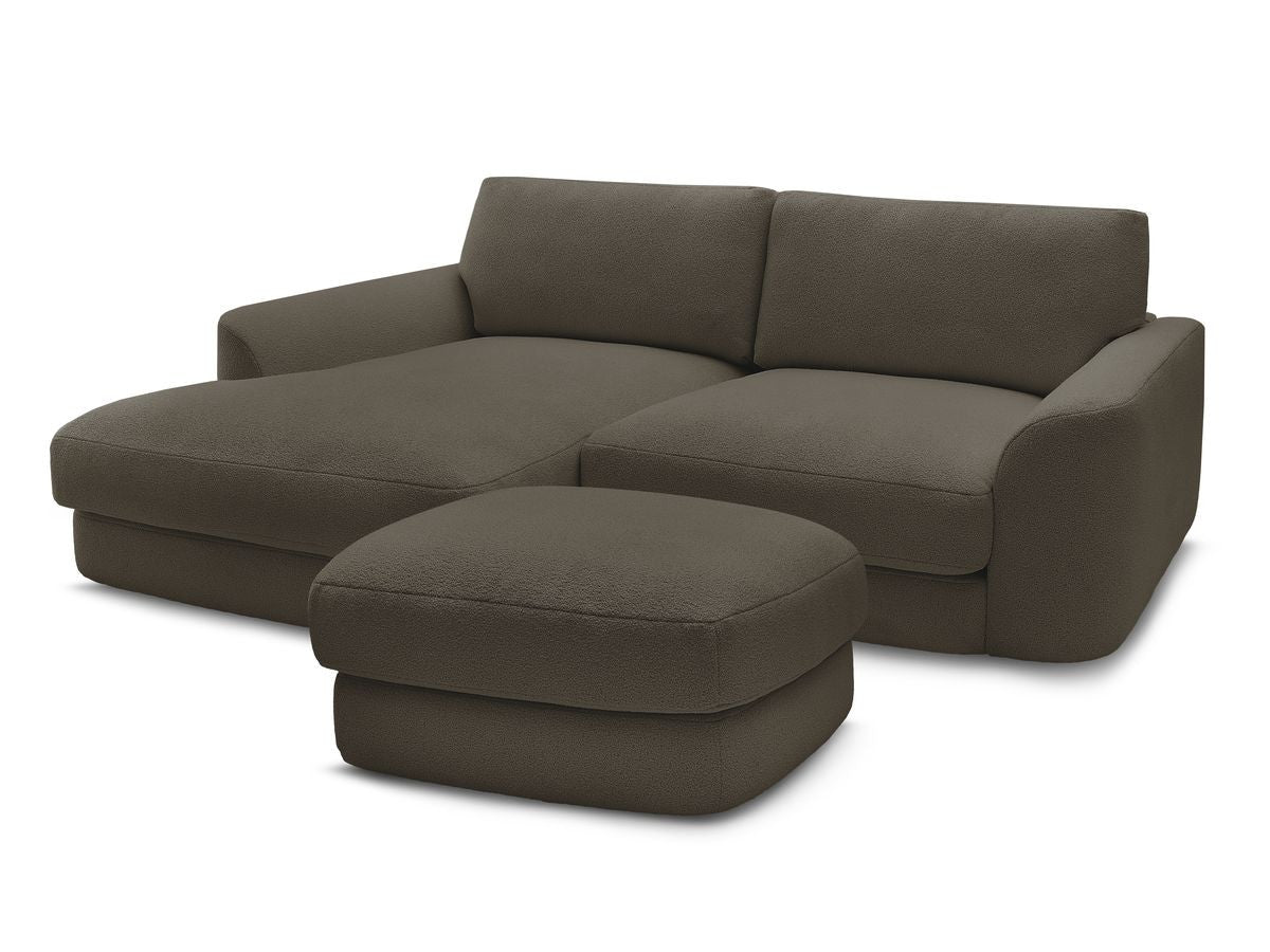 Hjørnesofa LEONORE i bouclé-stoff med puff