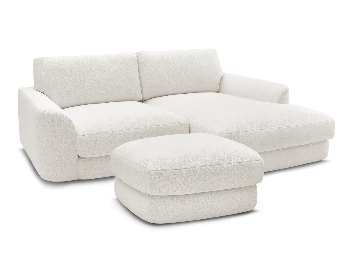 Hjørnesofa LEONORE i bouclé-stoff med puff