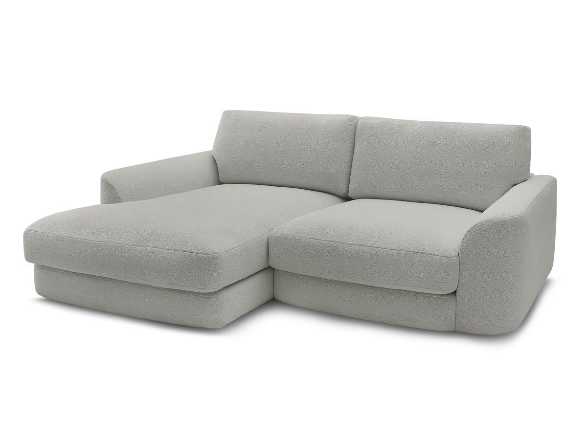 Hjørnesofa LEONORE i bouclé-stoff