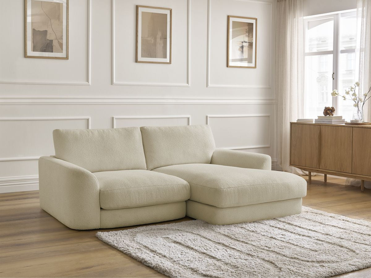 Hjørnesofa LEONORE i bouclé-stoff