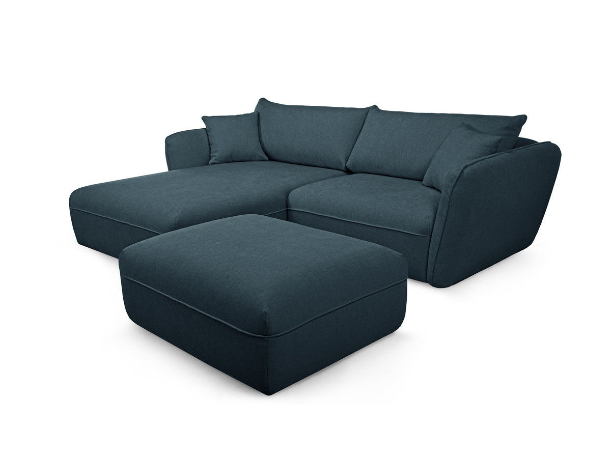 Hjørnesofa LUIGI i glatt stoff med puff