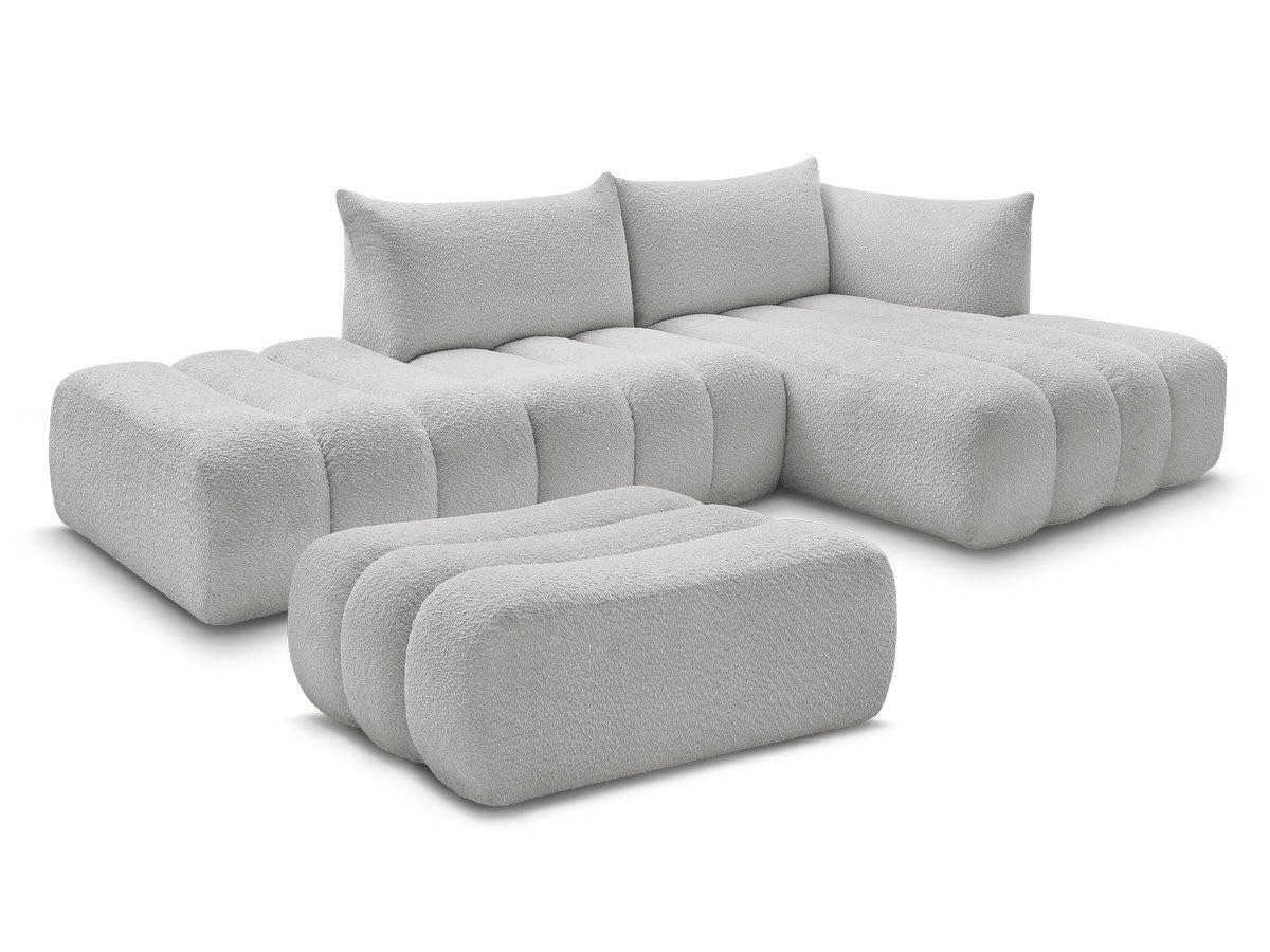 Modulær hjørnesofa AZRA i bouclé-stoff med puff