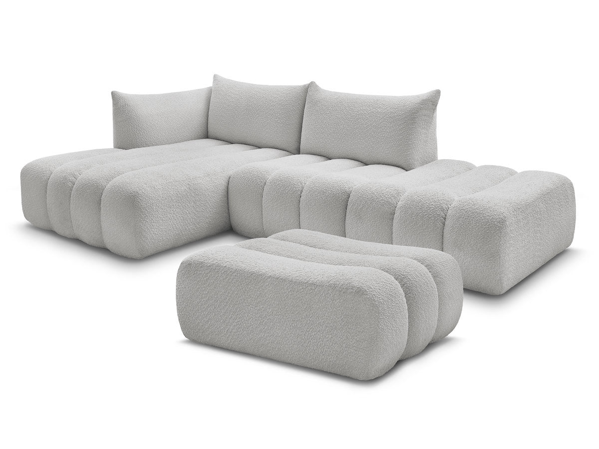Modulær hjørnesofa AZRA i bouclé-stoff med puff