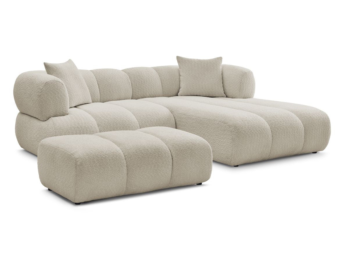 Hjørnesofa PAMIRA i bouclé-stoff med puff