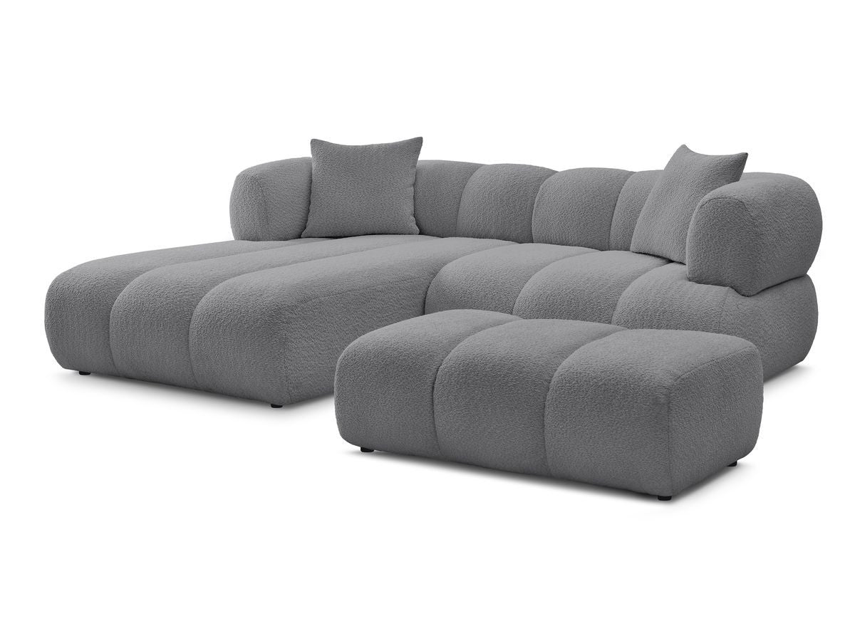 Hjørnesofa PAMIRA i bouclé-stoff med puff