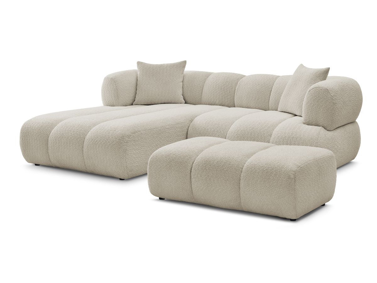 Hjørnesofa PAMIRA i bouclé-stoff med puff