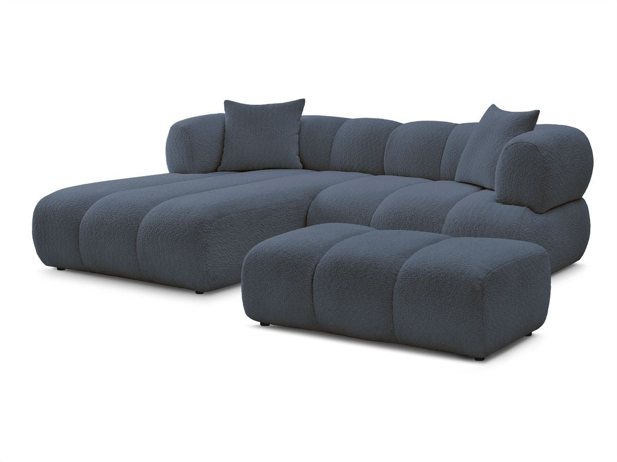 Hjørnesofa PAMIRA i bouclé-stoff med puff