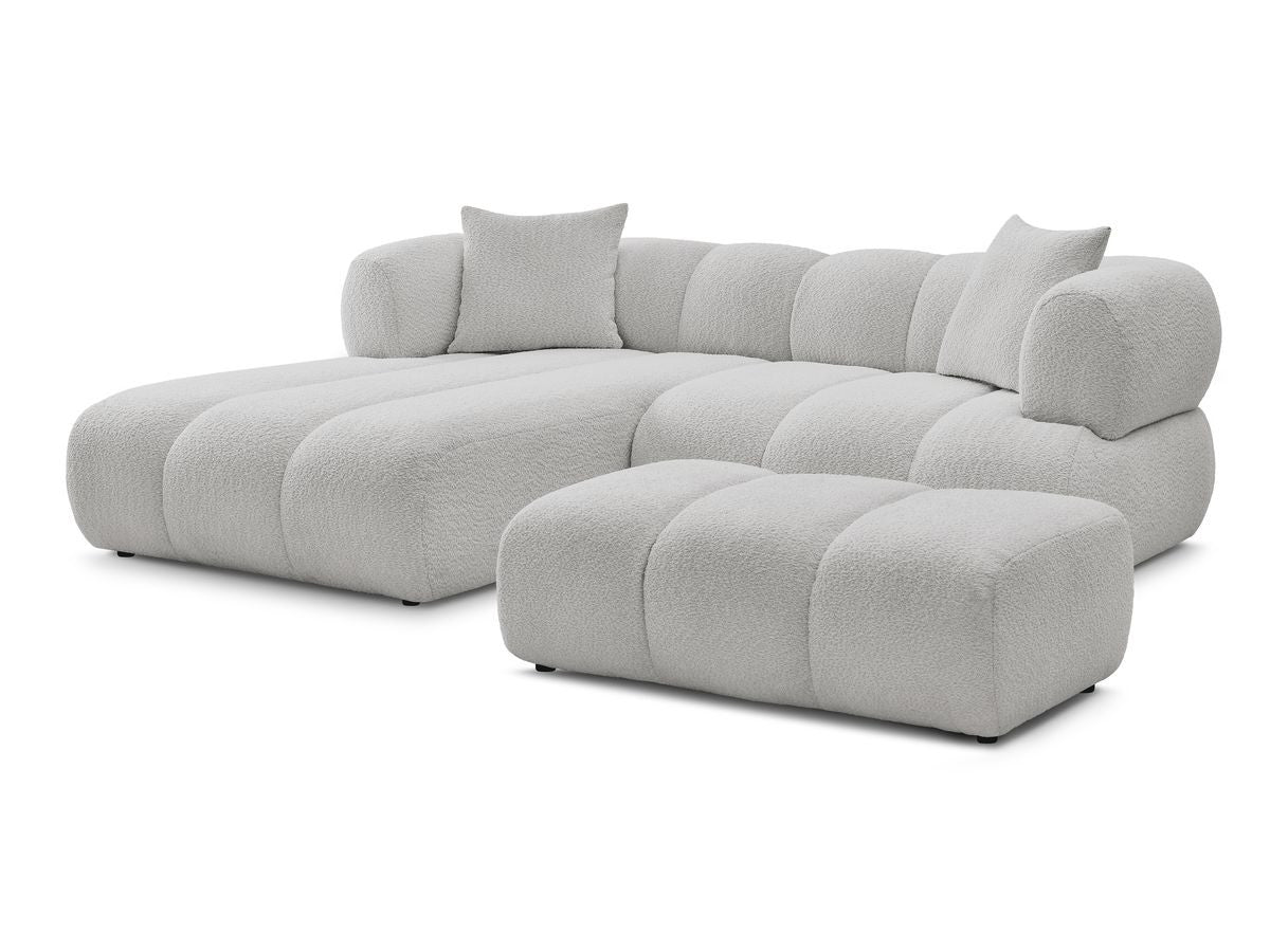 Hjørnesofa PAMIRA i bouclé-stoff med puff