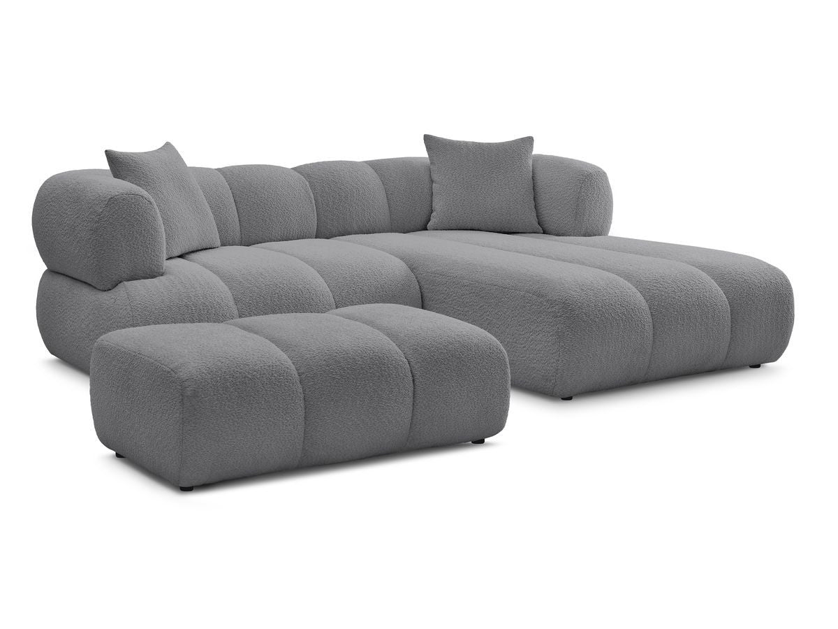 Hjørnesofa PAMIRA i bouclé-stoff med puff