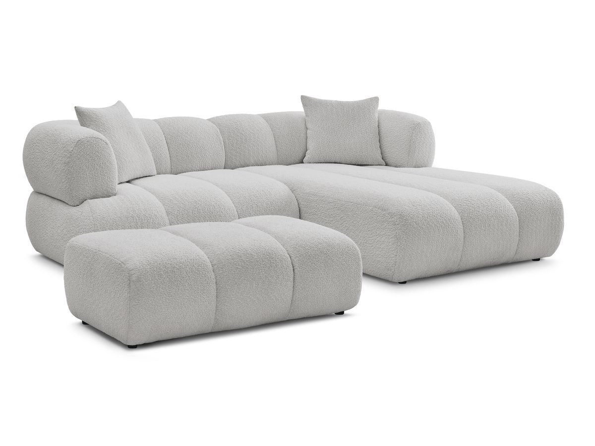 Hjørnesofa PAMIRA i bouclé-stoff med puff