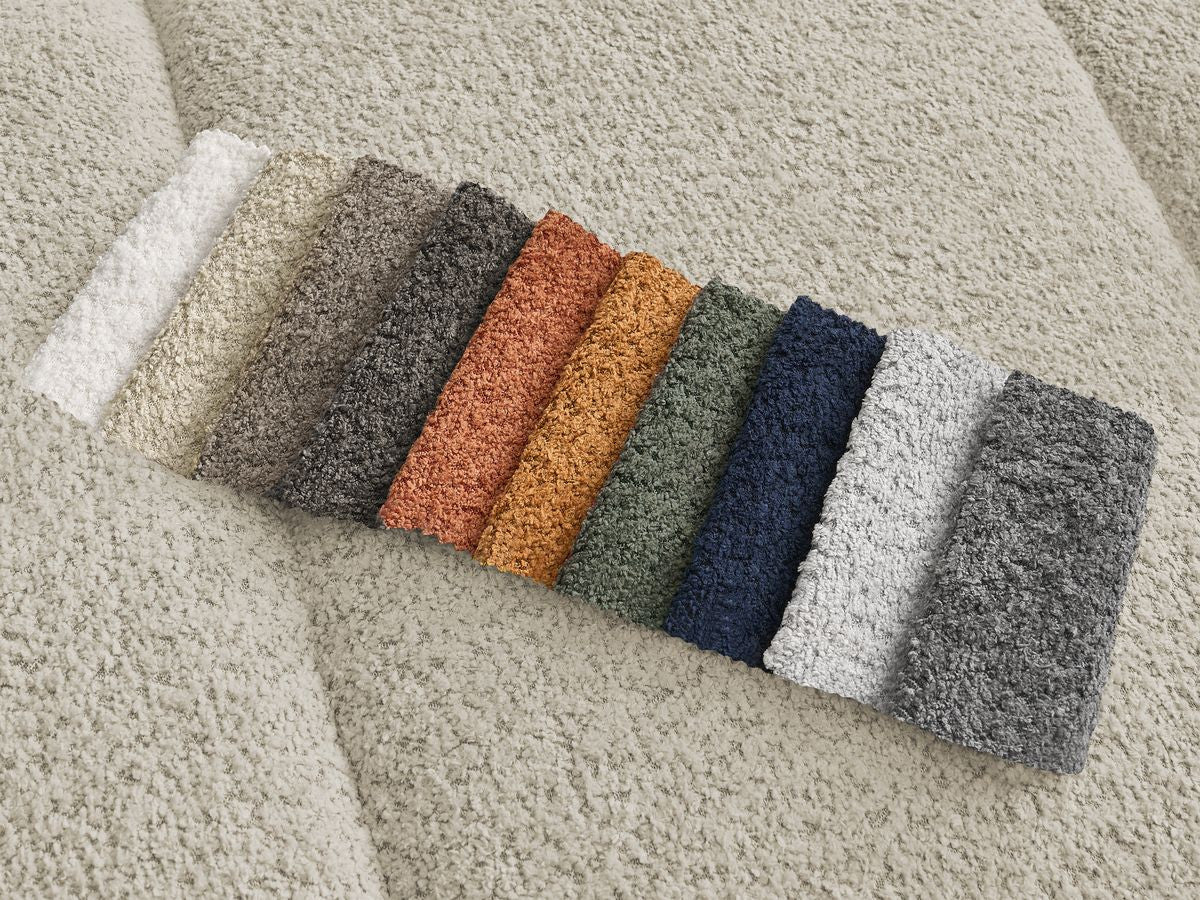 Hjørnesofa PAMIRA i bouclé-stoff