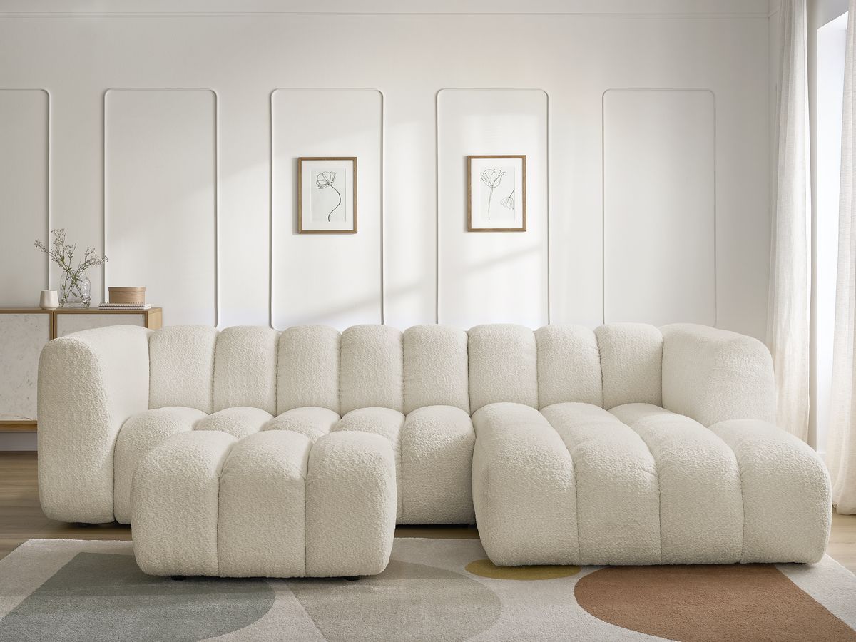 Hjørnesofa TALIA i bouclé-stoff med puff