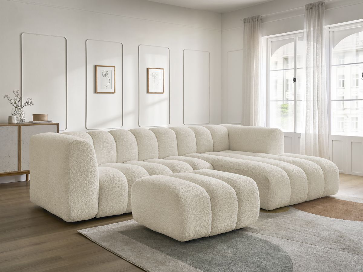 Hjørnesofa TALIA i bouclé-stoff med puff