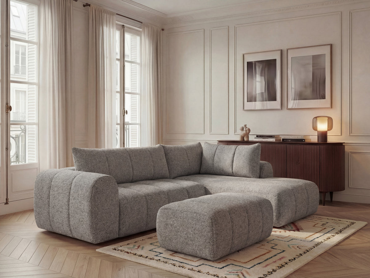 L-hjørnesofa NESTY i melert stoff med puff