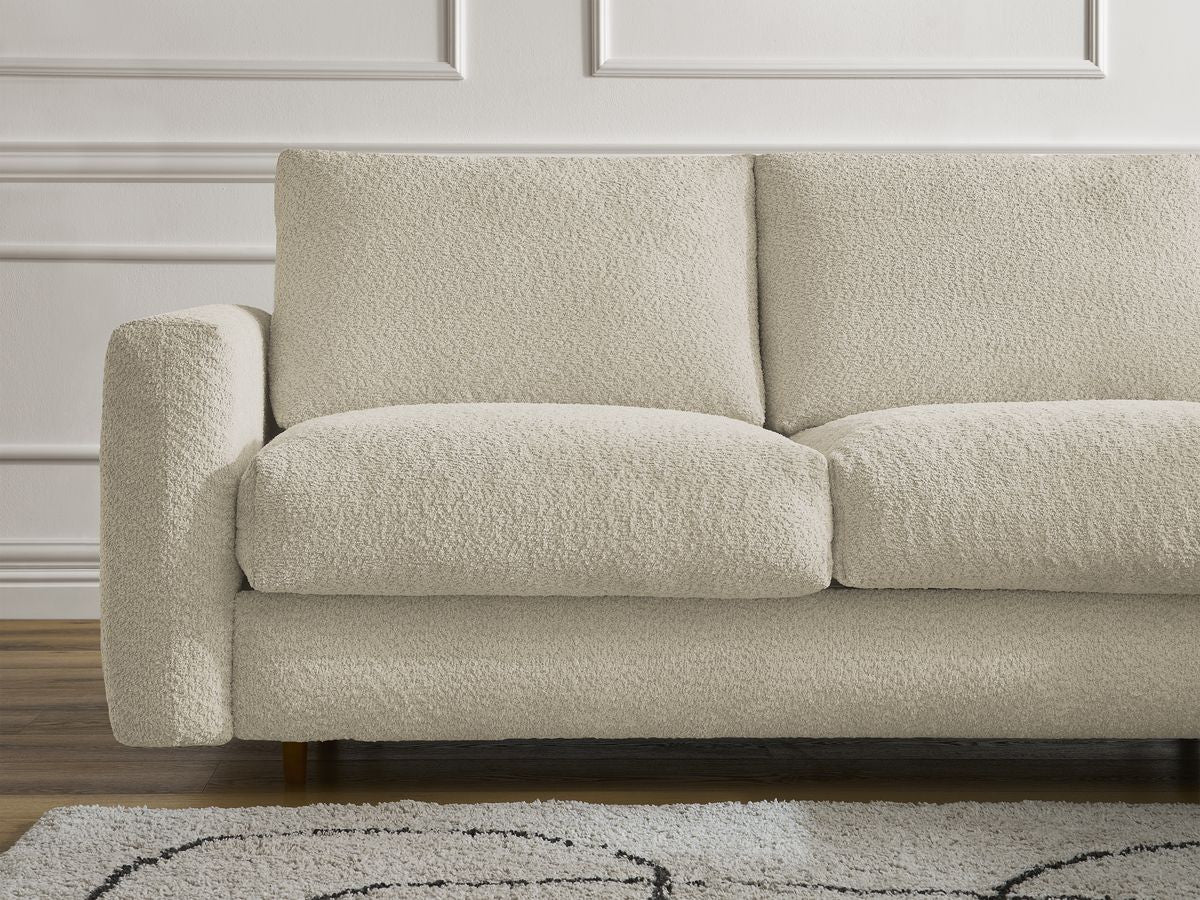 Vendbar hjørnesofa med sovefunksjon NYHET COCOONE med hurtigåpning i bouclé-stoff