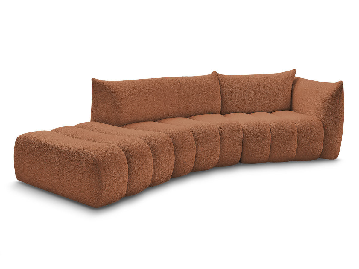 Sofa buet 4-seter AZRA i bouclé-stoff