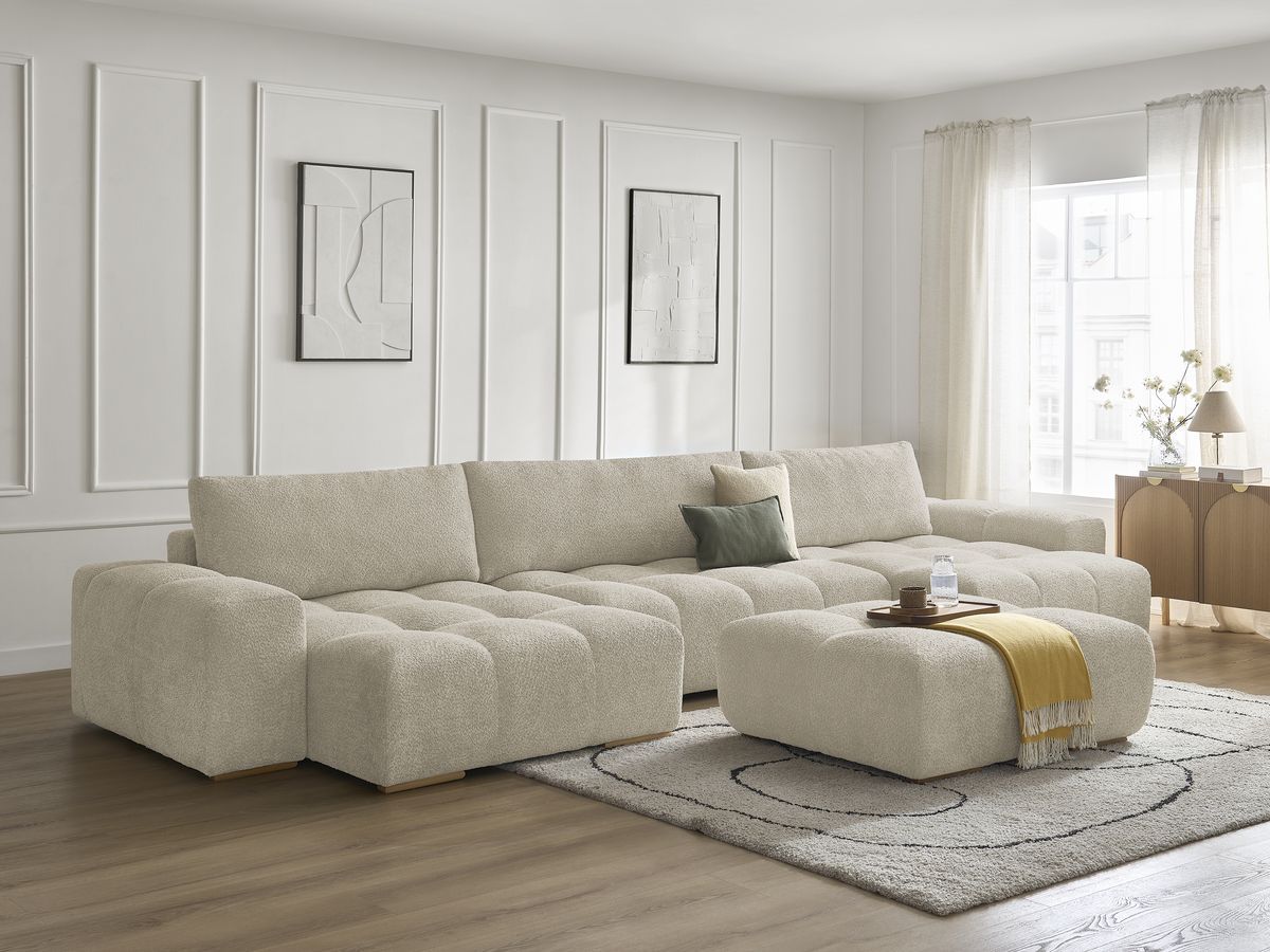 U-sofa ANAKIN i bouclé-stoff med puff